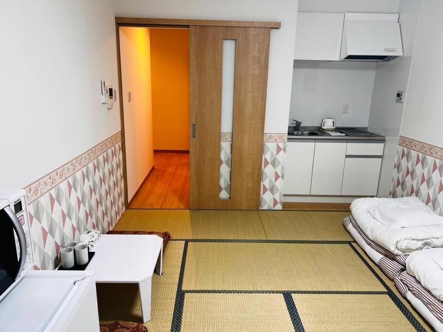 全新上线花跡民宿4号館102，关西机场直达萩之茶屋出站1分钟！难波、心斋桥4分钟车程！ Apartemen Osaka